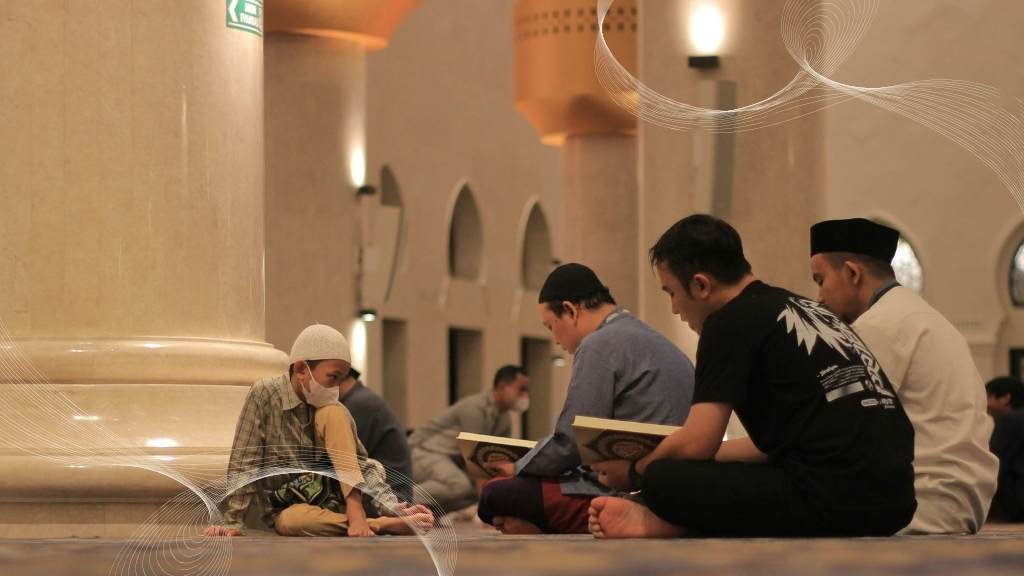 Muslims reading Quran in a mosque during Ramadan Month